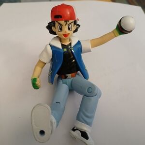 Action Figure with Red Cap and Blue Vest